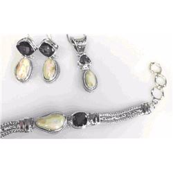 Sterling Silver Elk Ivory and Amethyst Bracelet, Pendant & Earrings from Studio Pandora. Value $1100