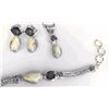 Image 1 : Sterling Silver Elk Ivory and Amethyst Bracelet, Pendant & Earrings from Studio Pandora. Value $1100