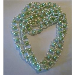Long beaded strand green and white necklace