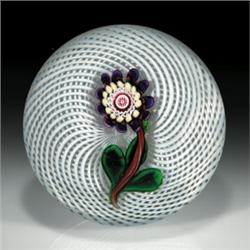 Rare antique Clichy millefiori and lampwork blossom paperweight, with a stylized central flower,...