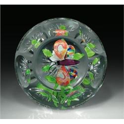 Antique Baccarat butterfly and double clematis paperweight, containing a marbled, multi-colored...