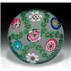 Image 1 : Rare antique Clichy Rose and garland paperweight, with a trefoil garland of green and red millefi...