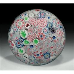 Rare antique Bacchus close packed complex millefiori paperweight, with canes in pink, red, blue,...