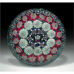 Rare antique St. Mande concentric millefiori paperweight, with five rings of assorted complex can...