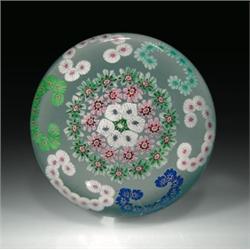 Antique Clichy C-scroll garlands millefiori paperweight, with a central floret/bundled rod cane,...