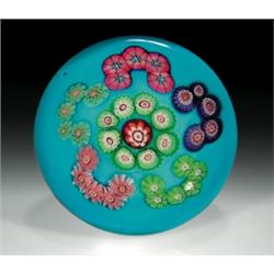 Antique Clichy C-scroll garlands paperweight, composed of a central red and white cane, encircled...