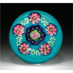 Antique Clichy spaced concentric millefiori paperweight, composed of a central pink and green Cli...