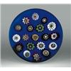 Image 1 : Antique Baccarat spaced millefiori on colorground paperweight, with assorted complex canes in re...
