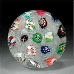Antique Clichy chequer millefiori paperweight, with spaced complex canes in red, blue, pink, purp...
