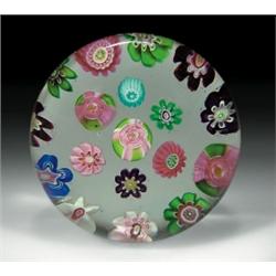Antique Clichy spaced complex millefiori paperweight, including three pink and green Clichy rose...
