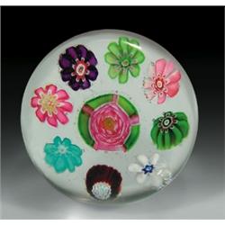 Antique Clichy miniature spaced complex millefiori paperweight, with a central pink and green Cli...