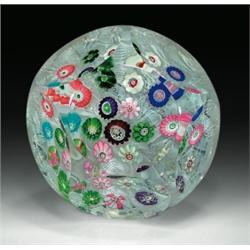 Antique Clichy scattered complex millefiori faceted paperweight, including one pink and green Cli...