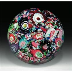 Antique Clichy scrambled millefiori paperweight, with whole and partial complex millefiori in pi...