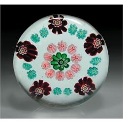 Antique Clichy miniature open concentric millefiori paperweight, with a central green and white p...