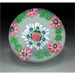 Antique Clichy miniature open concentric millefiori paperweight, with a central pink and green Cl...