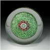 Image 1 : Antique Saint Louis millefiori paperweight, with a white, green, and red complex star cane center...