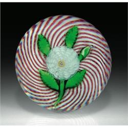 Antique Saint Louis pompon paperweight, containing a multi-tiered white flower, with a yellow co...