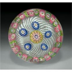 Antique Saint Louis patterned millefiori paperweight, with a chartreuse, pink, blue, and white c...