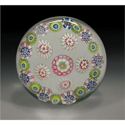 Antique Saint Louis miniature patterned millefiori paperweight, with a pastel pink, green, and wh...