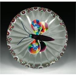 Antique Baccarat millefiori butterfly and garland paperweight, containing a butterfly, with marbl...