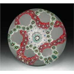 Antique Baccarat millefiori garlands paperweight, with a pair of interlaced trefoil garlands, on...