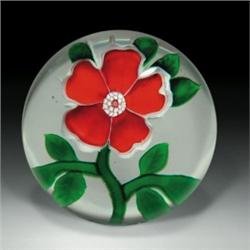 Antique Baccarat primrose paperweight, containing a single flower with five, white-edged, red pet...