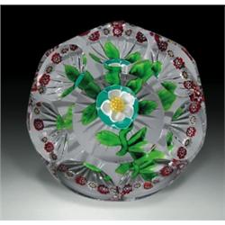 Antique Baccarat buttercup and garland faceted paperweight, composed of a white and turquoise lay...