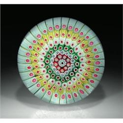 Antique Whitefriars magnum, high-domed, footed paperweight, with concentric millefiori, in shades...