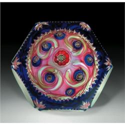 Antique Val St. Lambert scattered millefiori faceted paperweight, with a red pastry mold cane, su...