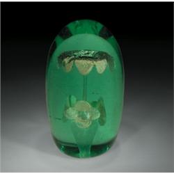 Antique Nailsea high-domed green bottle floral paperweight, with a large upright flower on a long...
