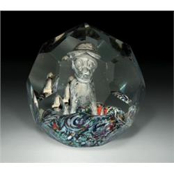 Antique Bohemian-Czechoslovakian faceted dog sulphide paperweight, with a three-dimensional, mar...