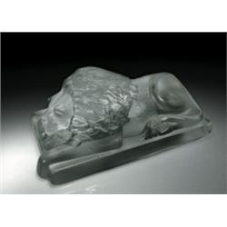 Antique Gillinder large molded glass lion paperweight, with a three-dimensional male lion, having...