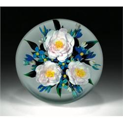 Rick Ayotte "Heavenly Blue" bouquet paperweight, with a trio of large pale pink camellia flowers,...