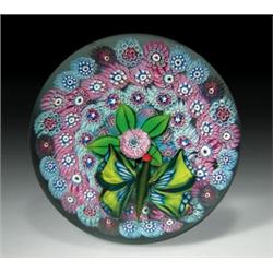 Delmo Tarsitano butterfly paperweight, having yellow and blue millefiori wings, over an upright...