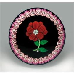 Paul Ysart red flower and garland paperweight, with a double-tiered red flower, having a white m...
