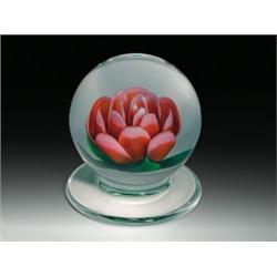Charles Kaziun, Jr. crimp rose pedestal paperweight, composed of an upright rose, having light p...