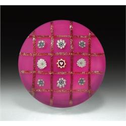 Charles Kaziun, Jr. chequer millefiori paperweight, with nine, spaced, complex canes, including a...