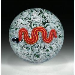 Charles Kaziun, Jr. miniature snake paperweight, containing a red and yellow striped snake with...