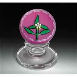 Charles Kaziun, Jr. miniature floral pedestal paperweight, containing a white and green millefio...