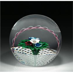 Crystal Saint-Louis 1994 bouquet and basket experimental paperweight, containing an encased upri...
