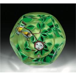 Cristal Saint-Louis 1995 bird and nest paperweight, composed of a multi-colored bird on a flat-l...