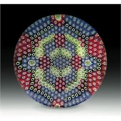 Cristal Saint-Louis 1995 millefiori paperweight, with patterned complex canes of red, blue, gree...