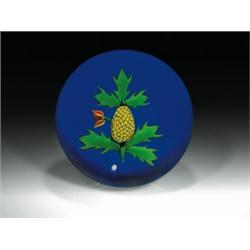 Baccarat 1988 yellow pineapple paperweight, consisting of a yellow millefiori pineapple, on a ste...