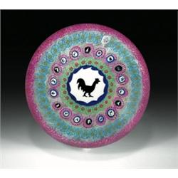 Baccarat 1971 Gridel rooster and concentric millefiori paperweight, with a large, central Gridel...