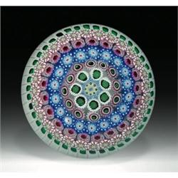Drew Ebelhare close concentric millefiori paperweight, in blue, pink, green, and white, includin...