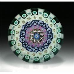 Drew Ebelhare miniature close concentric millefiori paperweight, with a central complex "E" signa...