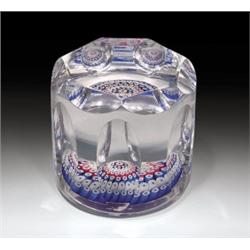 Whitefriars 1977 barrel-shaped millefiori paperweight, with concentric canes in red, white, and...