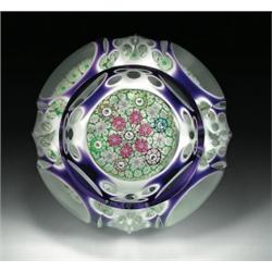 Perthshire Paperweights 1982 encased double overlay millefiori paperweight, containing a central...
