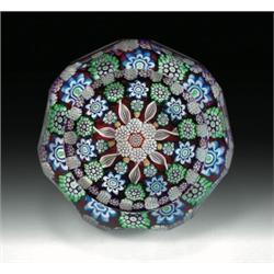 Perthshire Paperweights patterned millefiori paperweight, with a central cluster of complex canes...