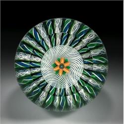 Perthshire Paperweights 1981 top-faceted crown paperweight, with a goldenrod lampwork flower, cen...